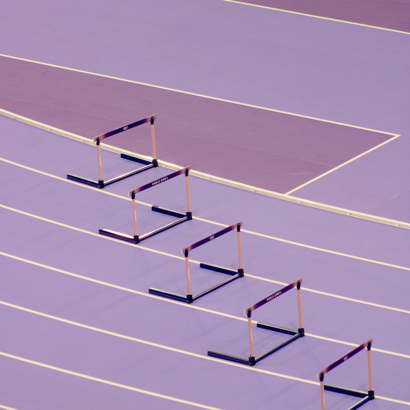 What happens to periods when you are an athlete? Purple track with hurdles.