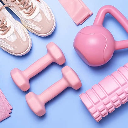 Running shoes and pink gym gear