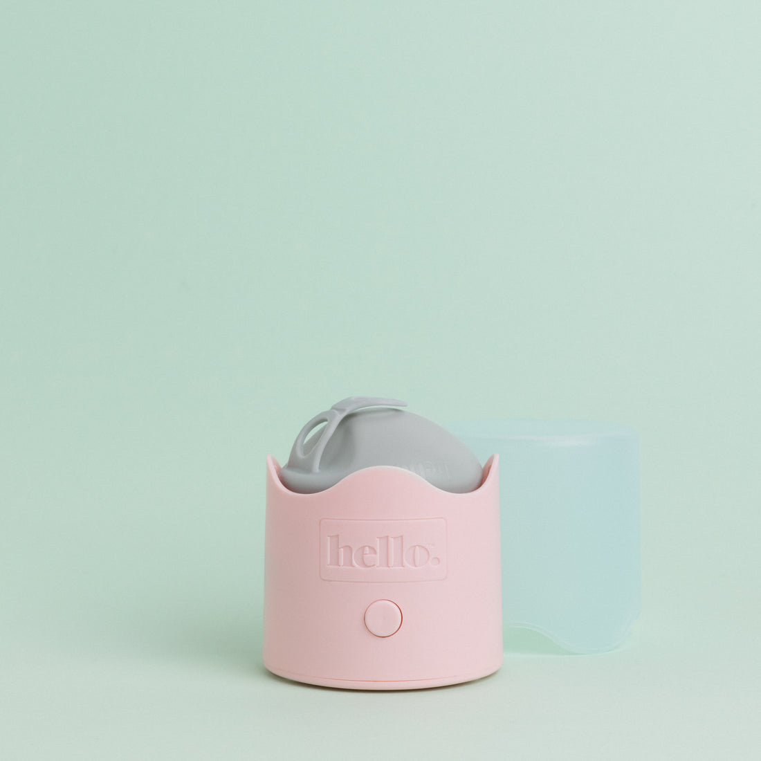 Hello Disc in sea fog sitting on the pink base of a Hello Steamy against a green background