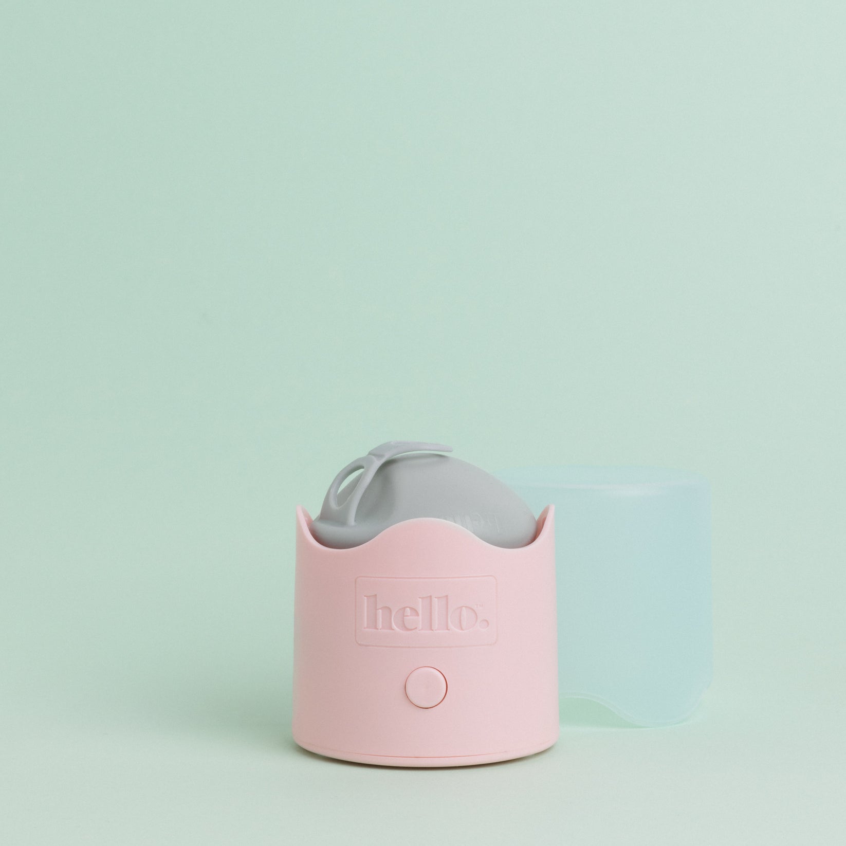 Hello Disc in sea fog sitting on the pink base of a Hello Steamy against a green background