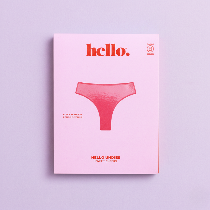 Pink underwear packaging with Hello Period branding on a light purple background