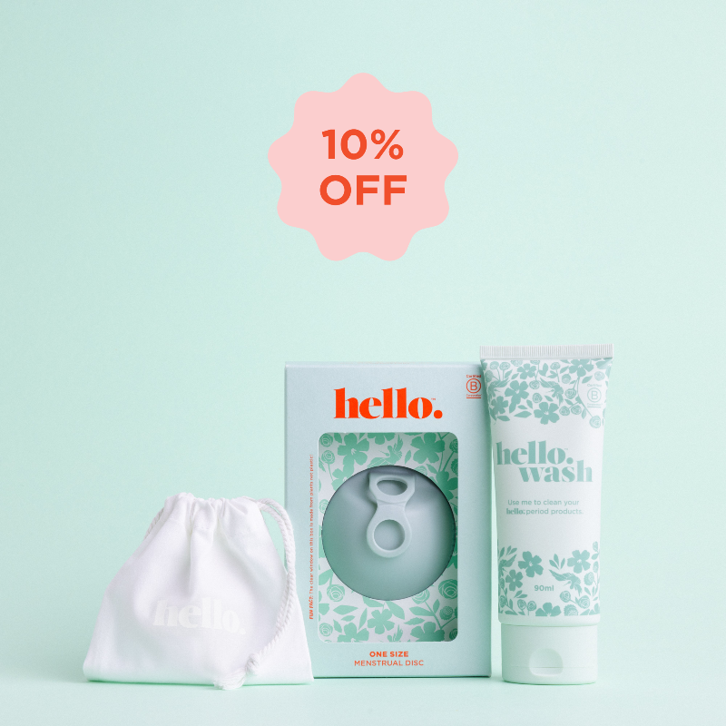 The image shows a bundle including a Hello Period menstrual disc in sea fog in a blue box next to a tube of gentle wash in a green tube with a floral design, and a white organic cotton storage bag, all against a light green background. A promotional text indicates a 10% discount.