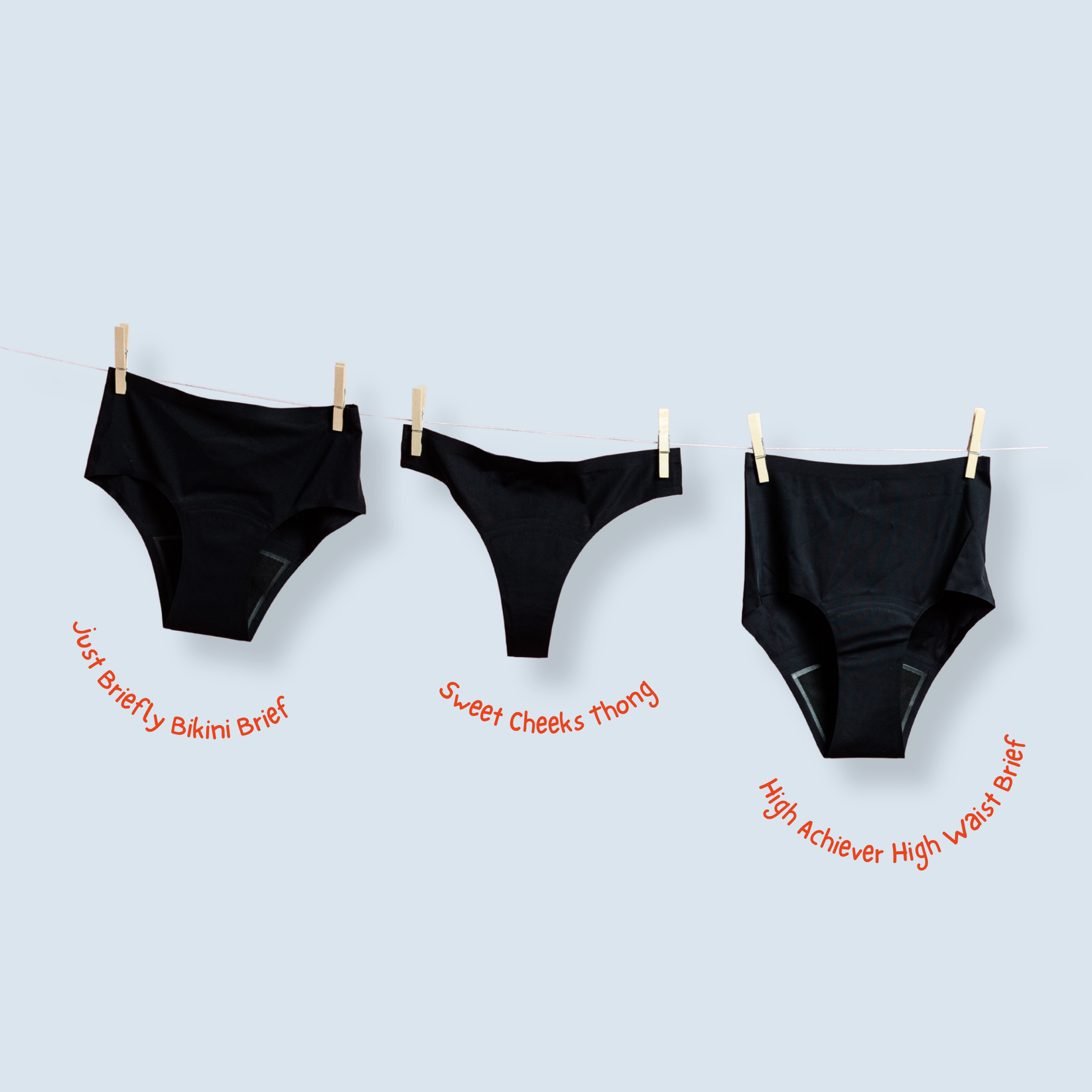 Three pairs of black period underwear hanging on a clothesline with labels describing each style on a light blue background